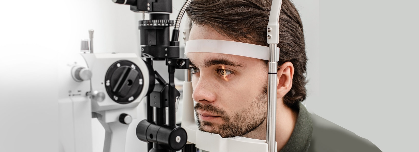 young man during eye exam in Greenville